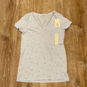 Target brand light blue v neck tee with lady bugs